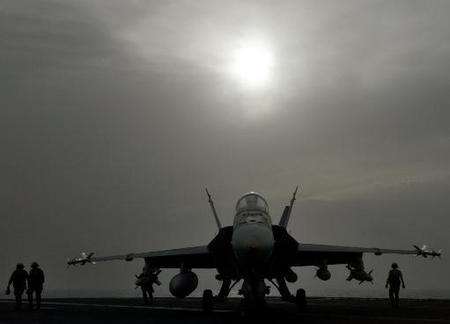 F/A-18 Hornet, being prepared for take off on the flight deck of the USS Harry S. Truman, April 6, 2003.